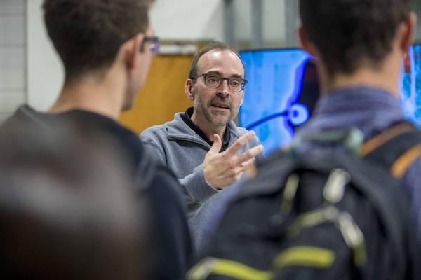 Professor speaking to students
