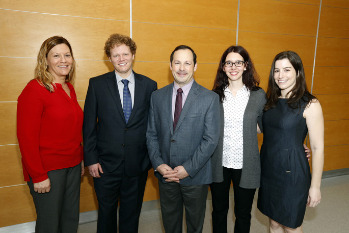 David Calkins, PhD, center, with members of his research team, from left, Wendi Lambert, PhD, Michael Risner, PhD, Melissa Cooper and Silvia Pasini, PhD. (photo by Steve Green)