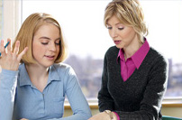 teacher meeting with student