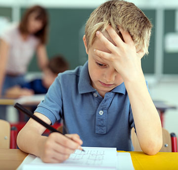 student working a problem sheet