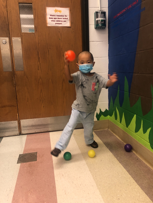 The Susan Gray School - child playing with ball