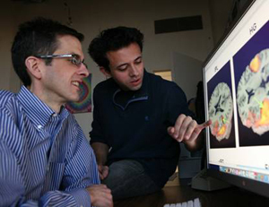 James Booth at computer with student