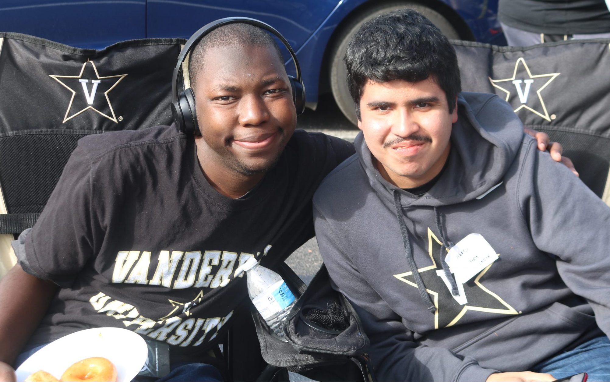 Students at football tailgate