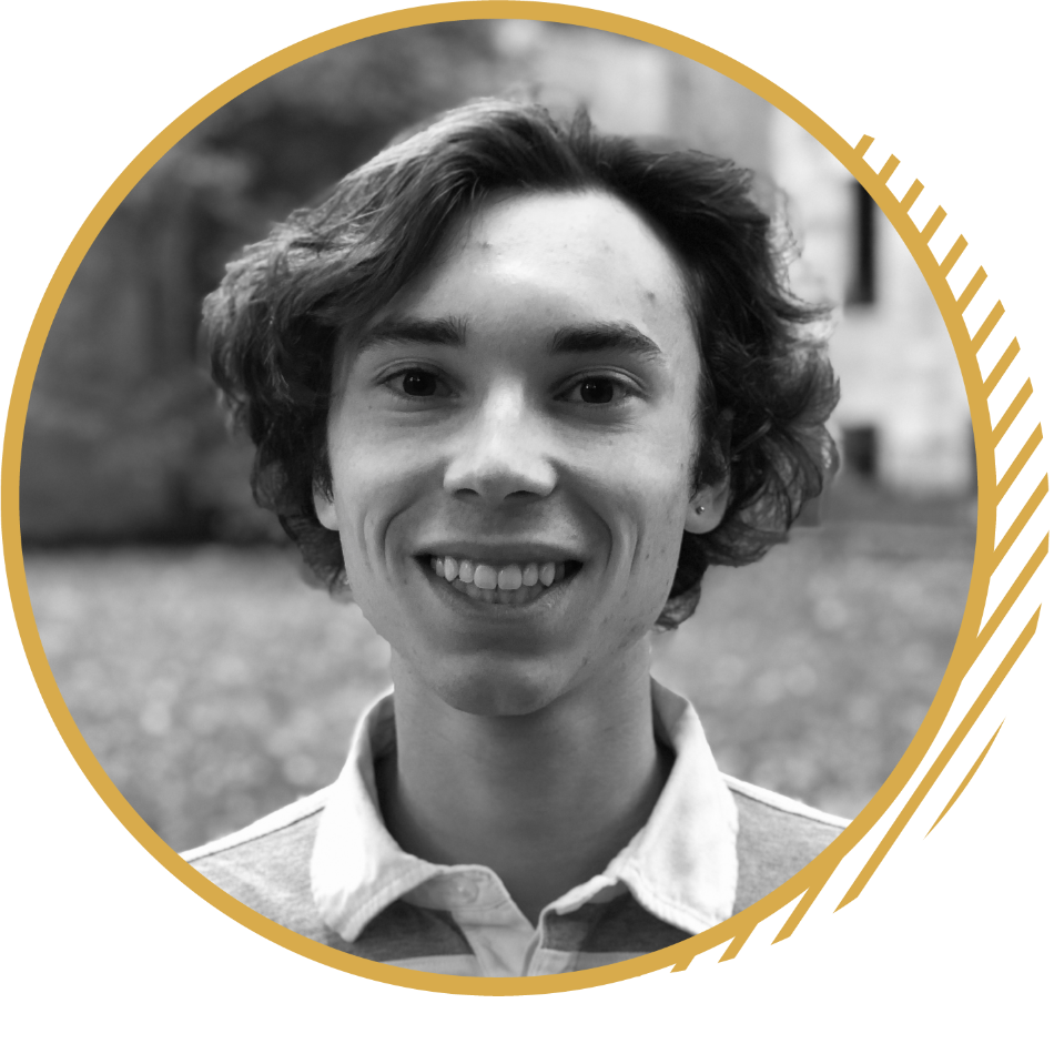 student outdoors smiling at camera