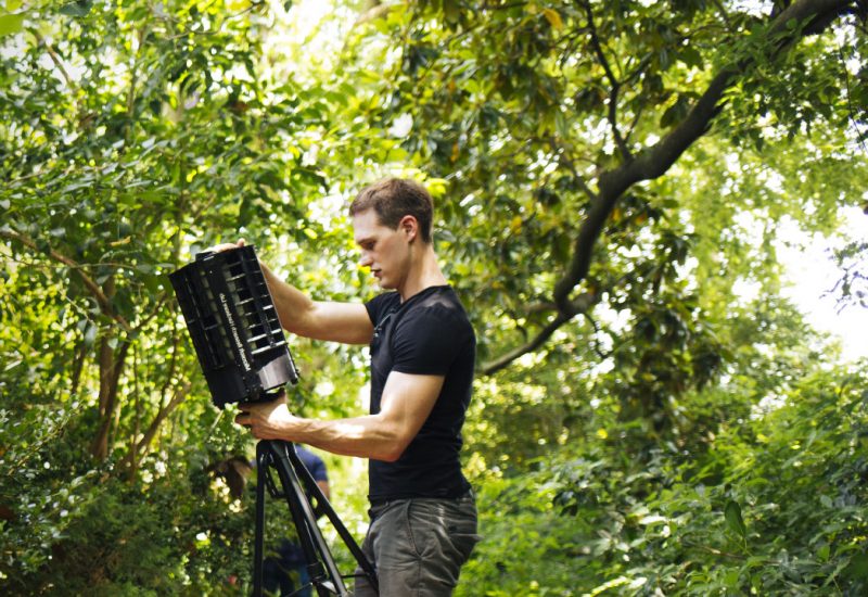 Ethan Jackson, Ph.D.’07, adjusts monitoring equipment during an early test of the Premonition disease detection system. 