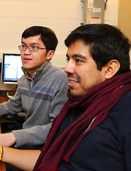 Zhou and Idrobo sitting at desk