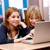 Two students using a computer