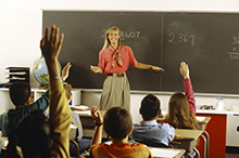 pals26_09_teacheratboard