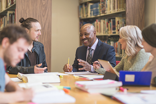 diver group of adults meeting in a library