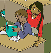 Teacher looking over the shoulder of a student