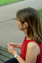 Gril with hearing aid