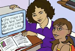 Teacher at computer with student