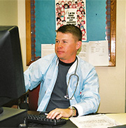 nurse at computer