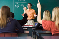 Teacher asking the students a question