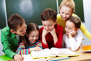 happy children around book