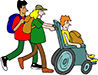 Students pushing another in a wheelchair