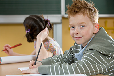 Drew smiling in his seat