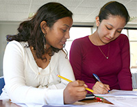 Two girls studying