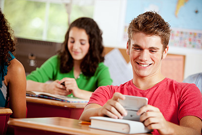 students on their cell phones