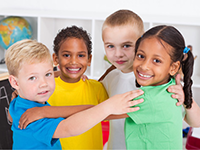 four children hugging