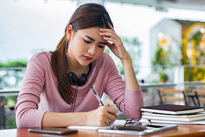 adult doing paperwork