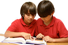 Two boys reading