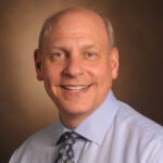 Headshot of Neil Osheroff.