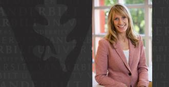 blonde woman in pink jacket