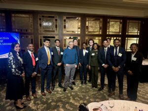 Shanay Desai posing with Bill Gates and other Horatio Alger Scholar Alumni.