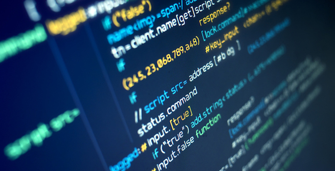 Modern programming source code on a computer screen. Background