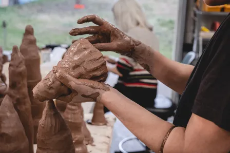In the spring of 2023, Vesna Pavlović and her team of collaborators invited community members to create clay vessels representing cypress tree roots at the Buchanan Arts Center in Nashville, TN. (Photo by Lesa Dowdy)