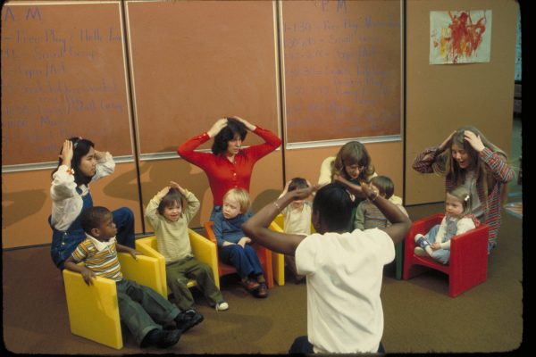 Teachers and visually impaired students play a game in an Experimental School classroom.