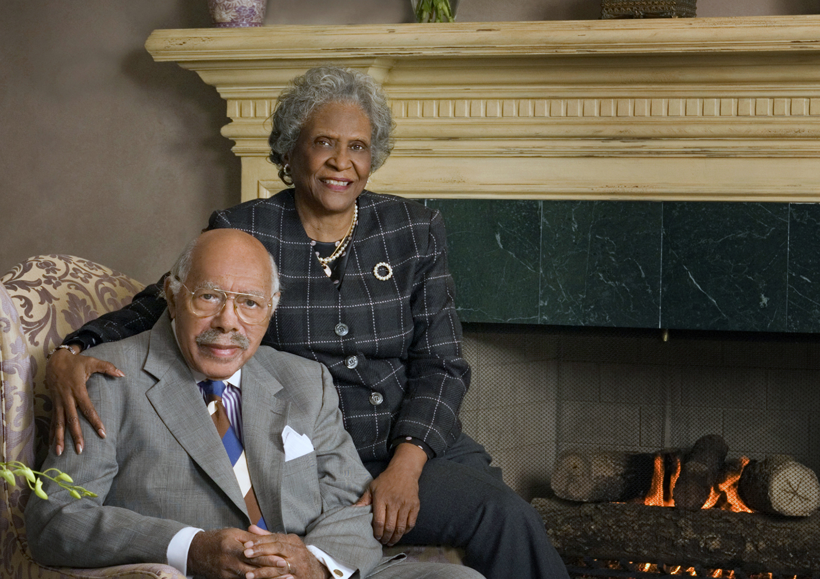 Mary and Robert Churchwell Sr. in a portrait shot taken before a fireplace