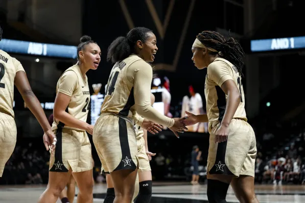 Teammates Ryanne Allen, Marnelle Garraud, and Ciaja Harbison.