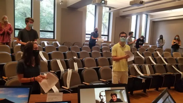 In the 1980s, American Jewish bar mitzvah boys and bat mitzvah girls “twinned” their coming of age ceremony with Soviet Jewish 13-year olds who were prevented from having a bar or bat mitzvah in the USSR because of government antisemitism. Each student in the JS 1111 was assigned one of the actual Soviet twins and given information about them. They channeled their inner 13-year-olds and delivered a short sermon that advocated for their twin’s freedom. Then, just as synagogues reserved empty chairs on the pulpit as a palpable symbol of the Soviet Jewish twin’s absence, the students wrote their twin’s name on the COVID-19 seat barriers next to them to reserve space in the classroom for their twin.