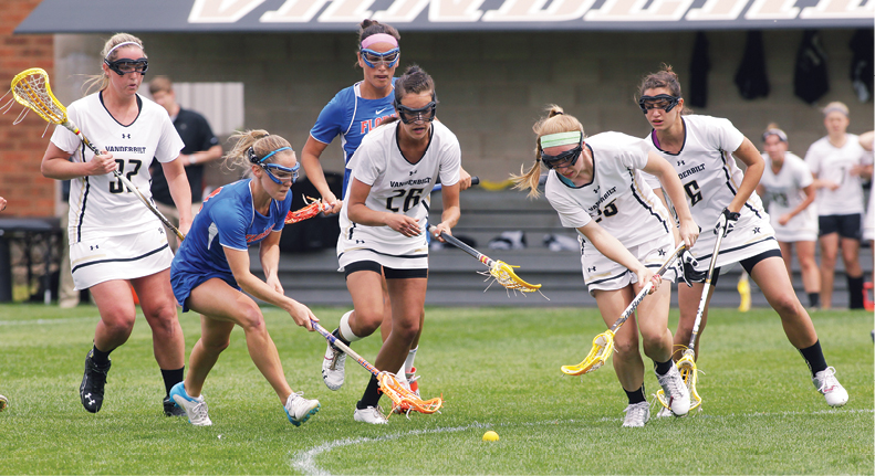 Photo of lacrosse team playing Florida