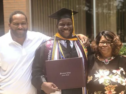 Logan Northcutt and his parents after his graduation from Morehouse College (Submitted photo)