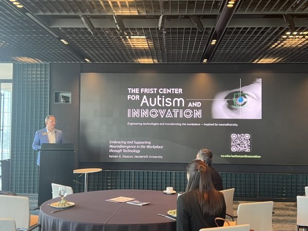 James Kellerhouse welcomes attendees to the event