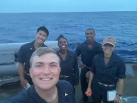Blake Christiansen with (from left to right) Bryan Wei (USNA ‘23), Mac Williams (USNA ‘23), Trent Parker (USNA ‘24), and Stella Ribaudo (USNA ‘24) while underway on the USS OSCAR AUSTIN in the Atlantic Ocean. This is a part of NROTC’s requirement for all Navy midshipmen to spend time shadowing a commissioned officer the summer before their senior year.