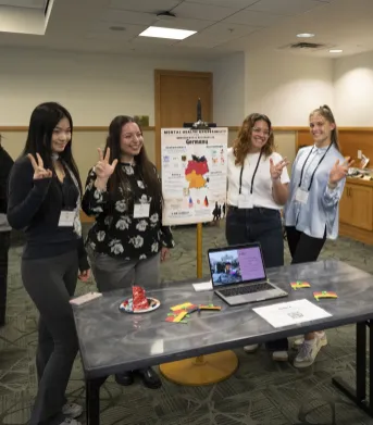 Poster presentation: Mental health accessibility in Germany: (left to right) Xin Hao, Gita Gouranmohit, Fabiana Icaza, and Tina Benzinger, 11/15/24 (Photo by Joe Howell/Vanderbilt University)