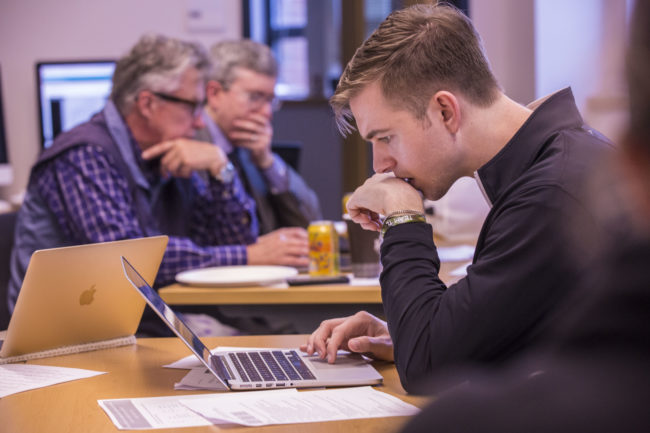 students and faculty transcribing Freedmen's Bureau records at the Center for Digital Humanities