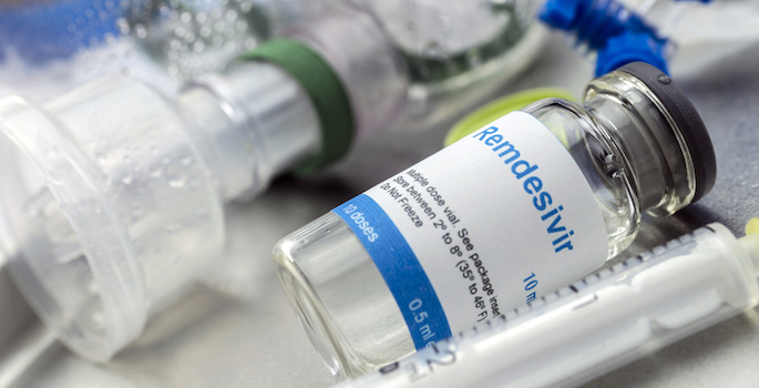 remdesivir vial on tray with syringe and respirator tubing and attachments