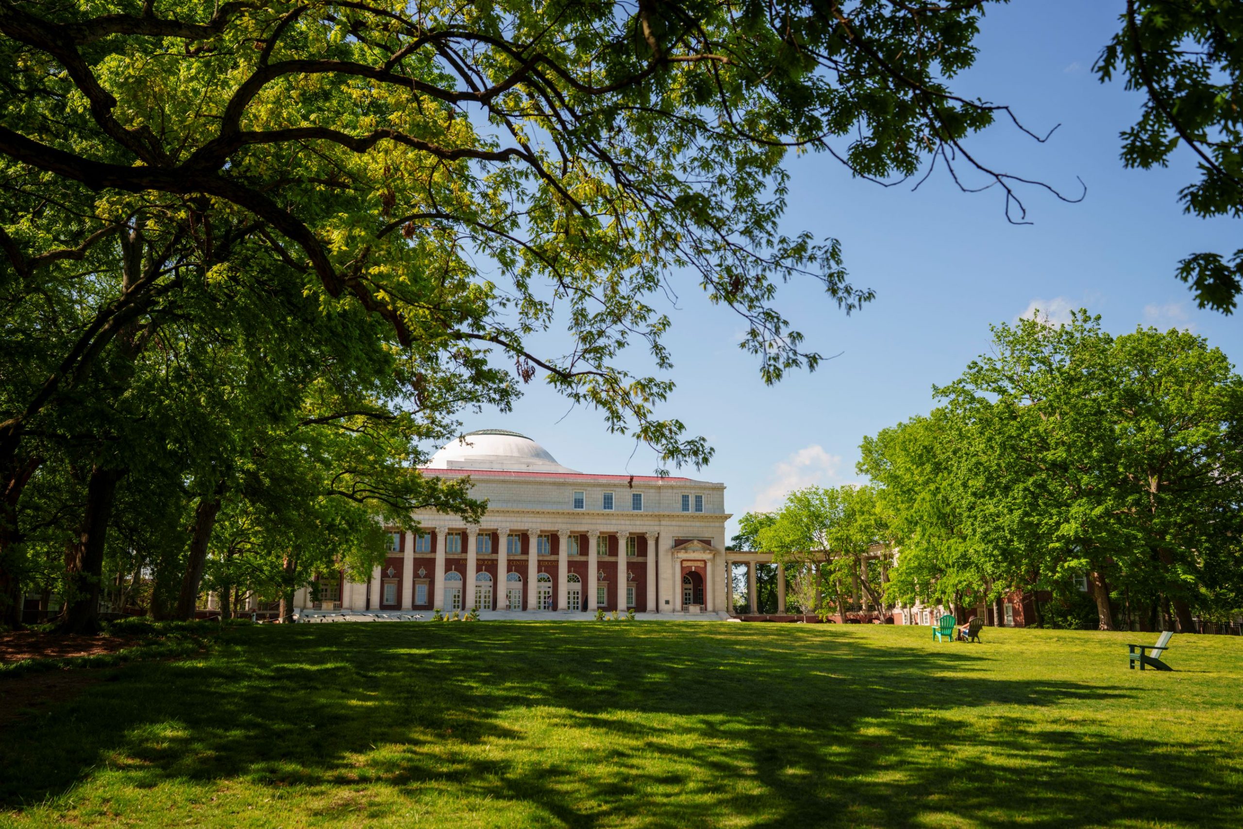 Peabody lawn in the fall with trees changing colors and Wyatt Center in the background