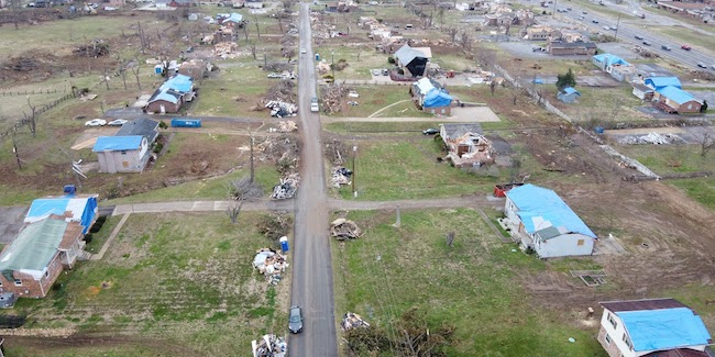 Debris piles and blue roof tarps dominate an area of Mount Juliet affected by the March 2020 tornados. The image was taken on March 11, 2020, a bit more than a week after the storms.