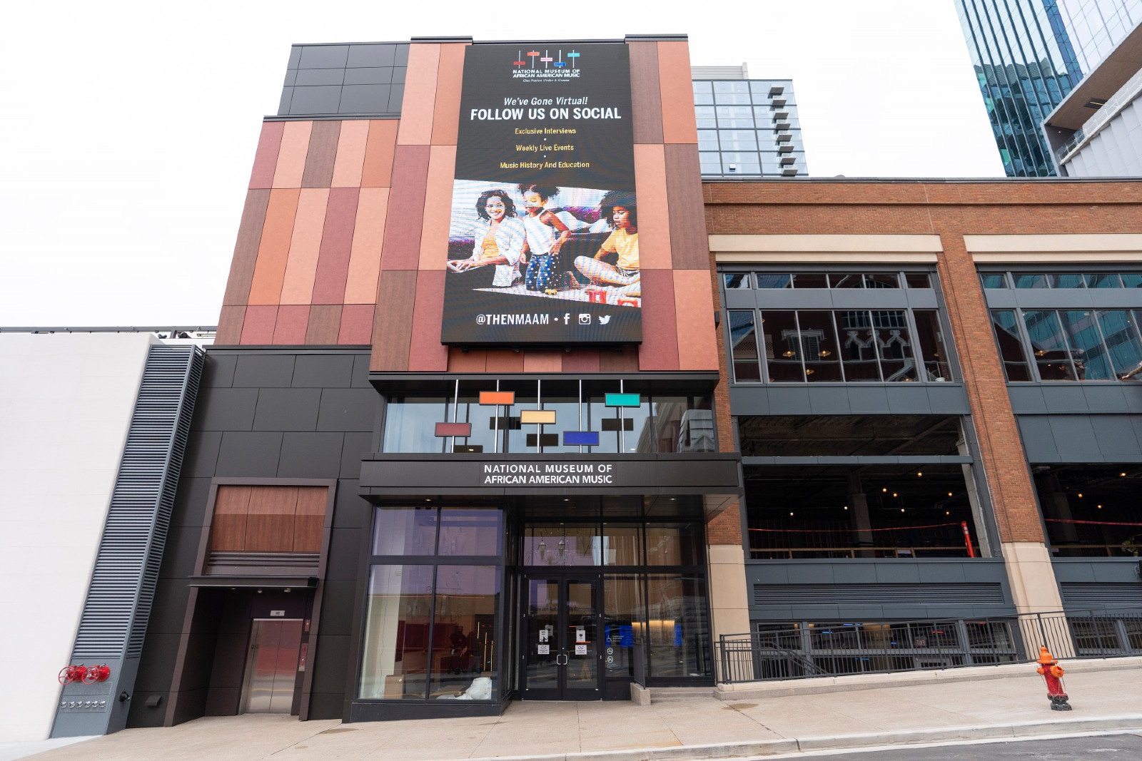 Photograph of externior of NMAAM against Nashville skyline