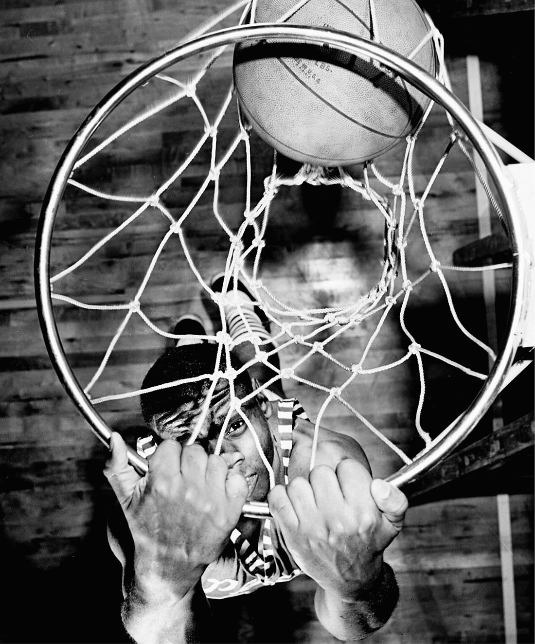 photo of Perry Wallace looking up through basketball hoop