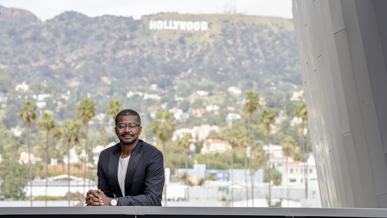 Filmmaker Mason Richards with the iconic HOLLYWOOD sign over his shoulder. (Ivo Nagel)