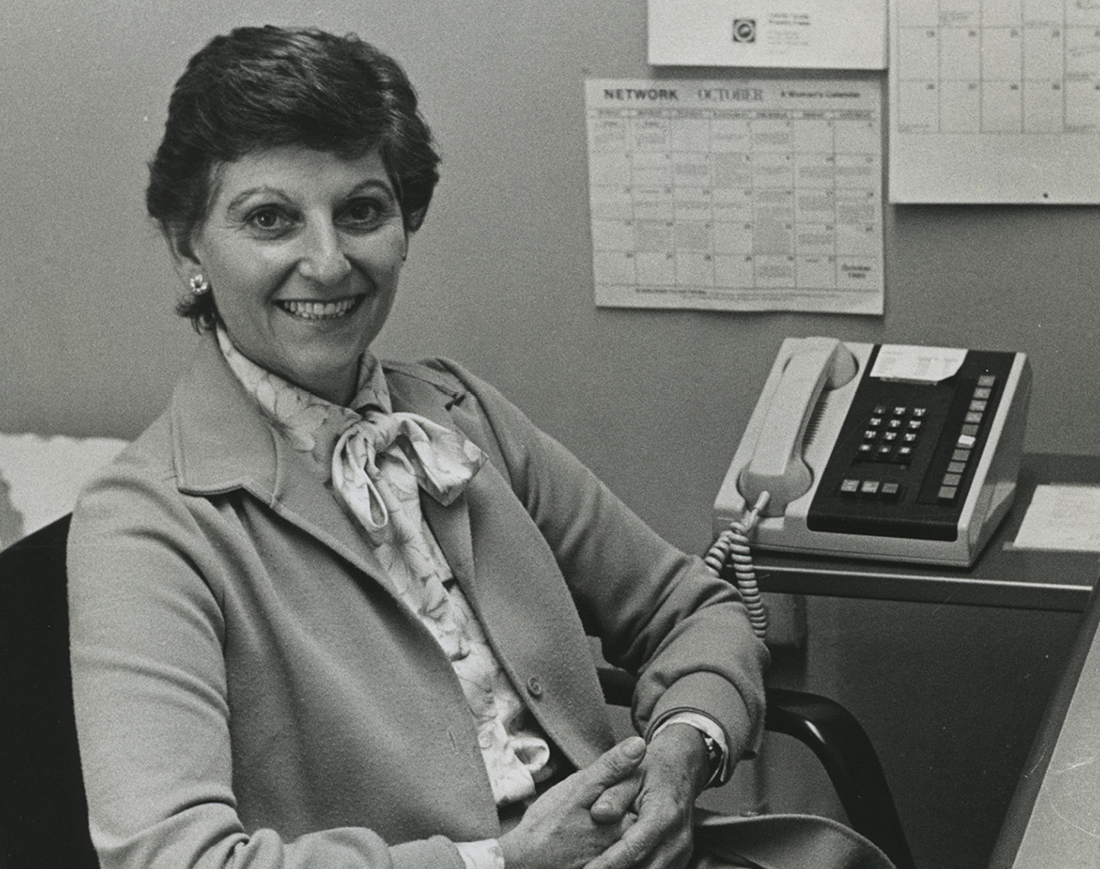black and white photo of Nancy Ransom sitting in her office in the 1970s