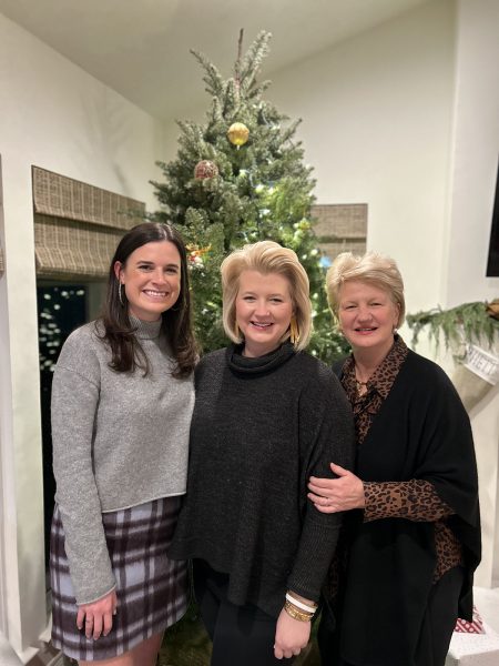The three women entrepreneurs of AR Reserve, Morgan Boniface, Anne Miller Morris and Suzanne Rich Miller,standing in front of a Christmas tree.