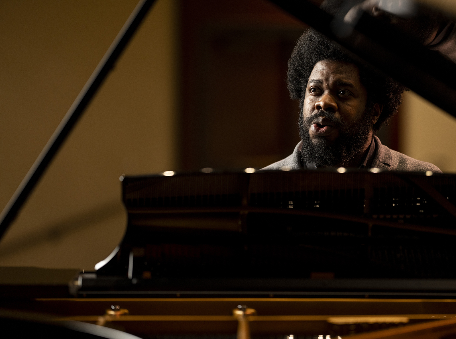 Blair voice professor Dashon Burton singing at the piano